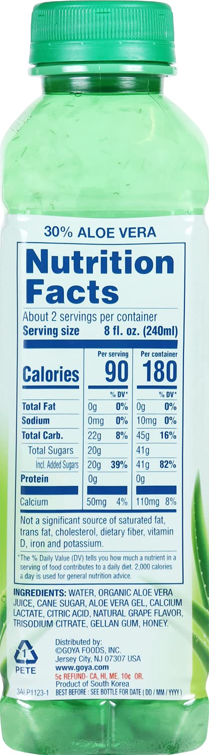 A green bottle of aloe vera juice with a prominent white Nutrition Facts label on the front, photographed against a plain white background.