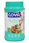 A container of Goya Sea Salt on a plain white background. The container is a bright turquoise color with a matching turquoise lid, featuring the blue and white Goya logo and an illustration of fresh salad vegetables on the front label.
